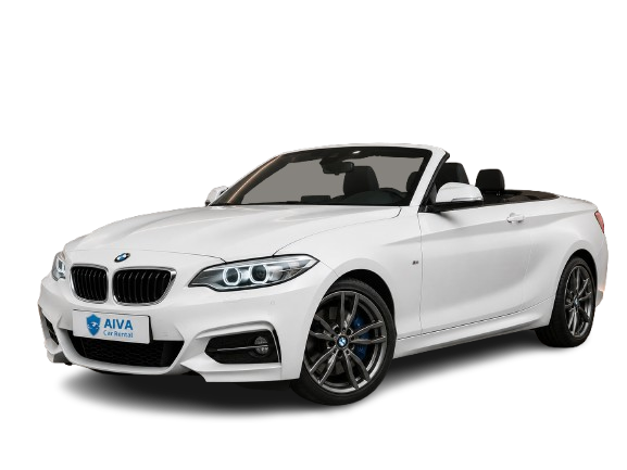 Белый кабриолет BMW 218i 2020 года, вид спереди и сбоку