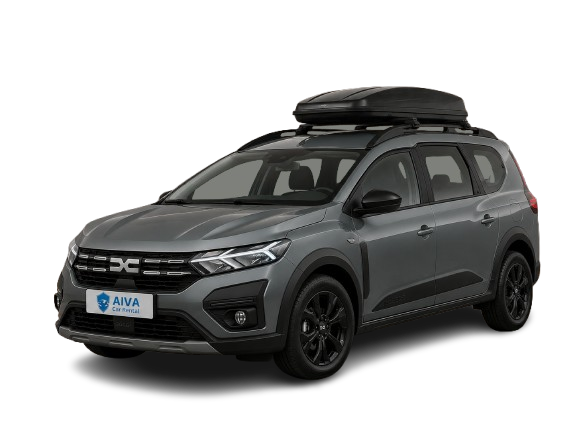 Tavan bagaj kutusu bulunan gri Dacia Jogger, önden üç çeyrek açıyla görüntüleniyor.